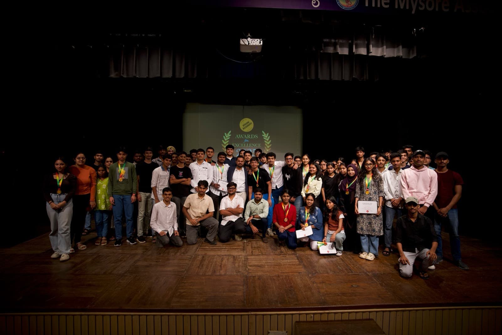 Vision Academy Awards for Excellence 2025 โ students on stage with their medals and certificates